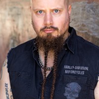 Jes Selane Headshot Biker Front