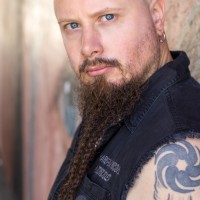 Jes Selane Headshot Biker Profile